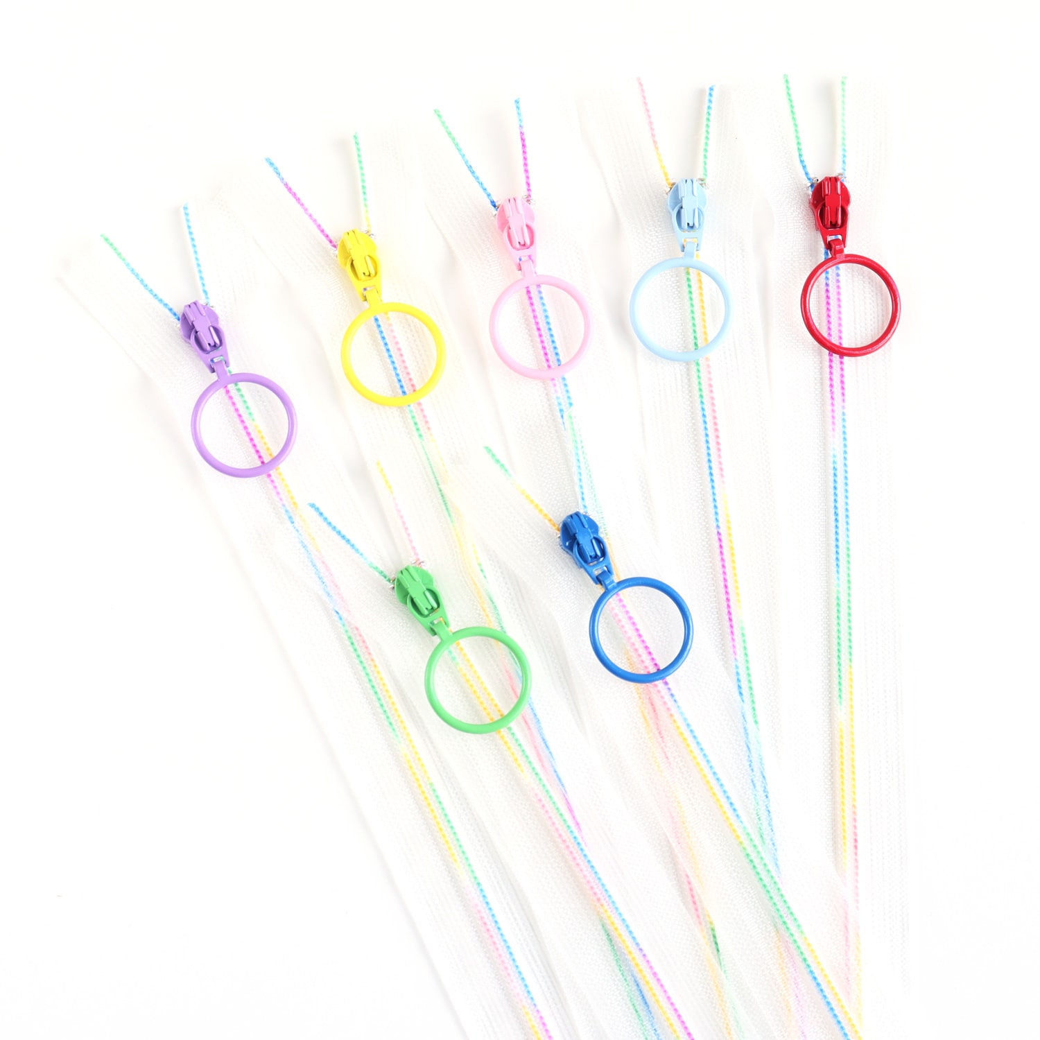 日本紐釦貿易 Y.K.K スケルトンファスナー 25cm レインボー 7本 SKF25-7MIX (ご注文単位1セット)【直送品】